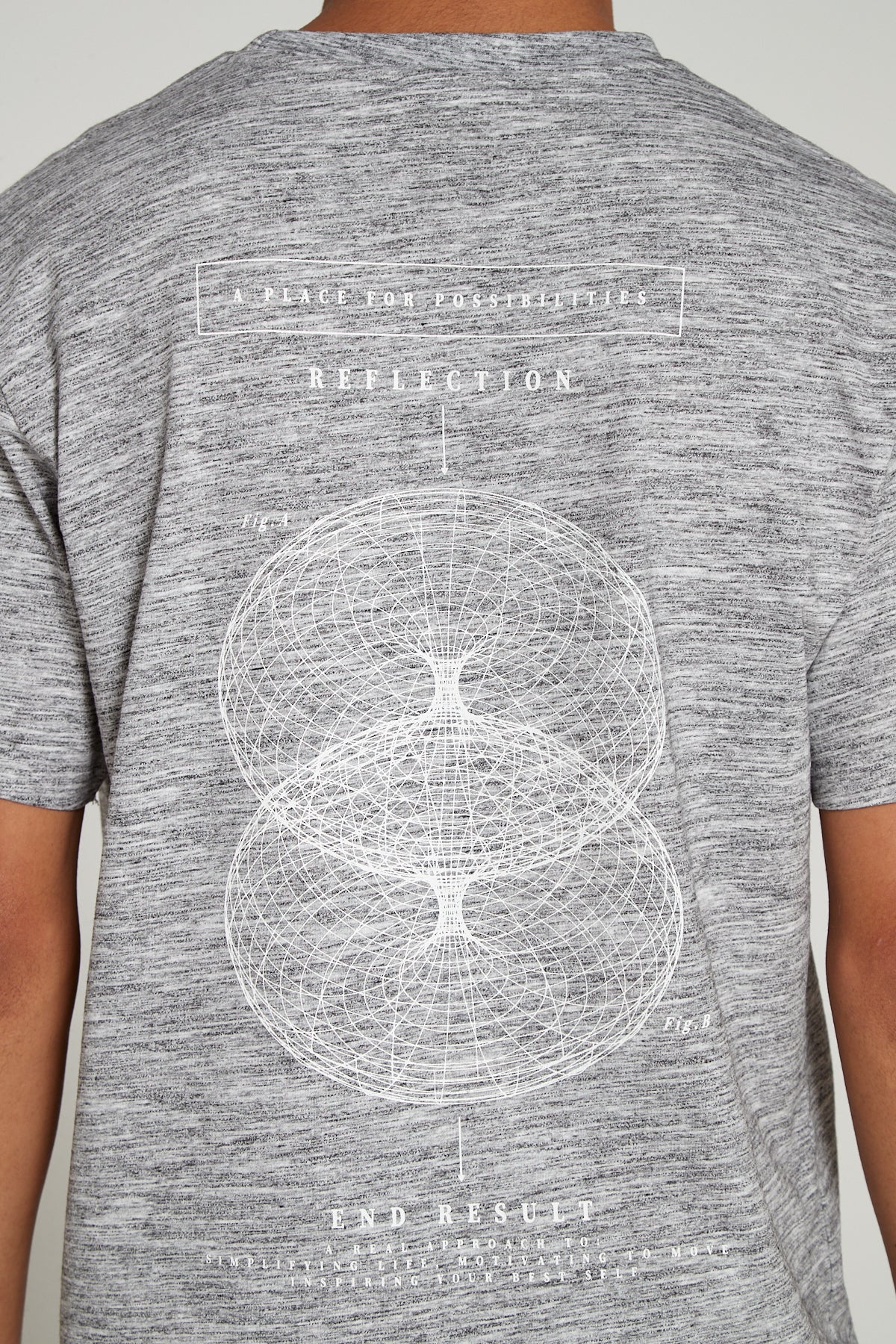 A close up view of Original Creator Reflection T-Shirt in Granite Grey color Reflection and end result graphics at the back.